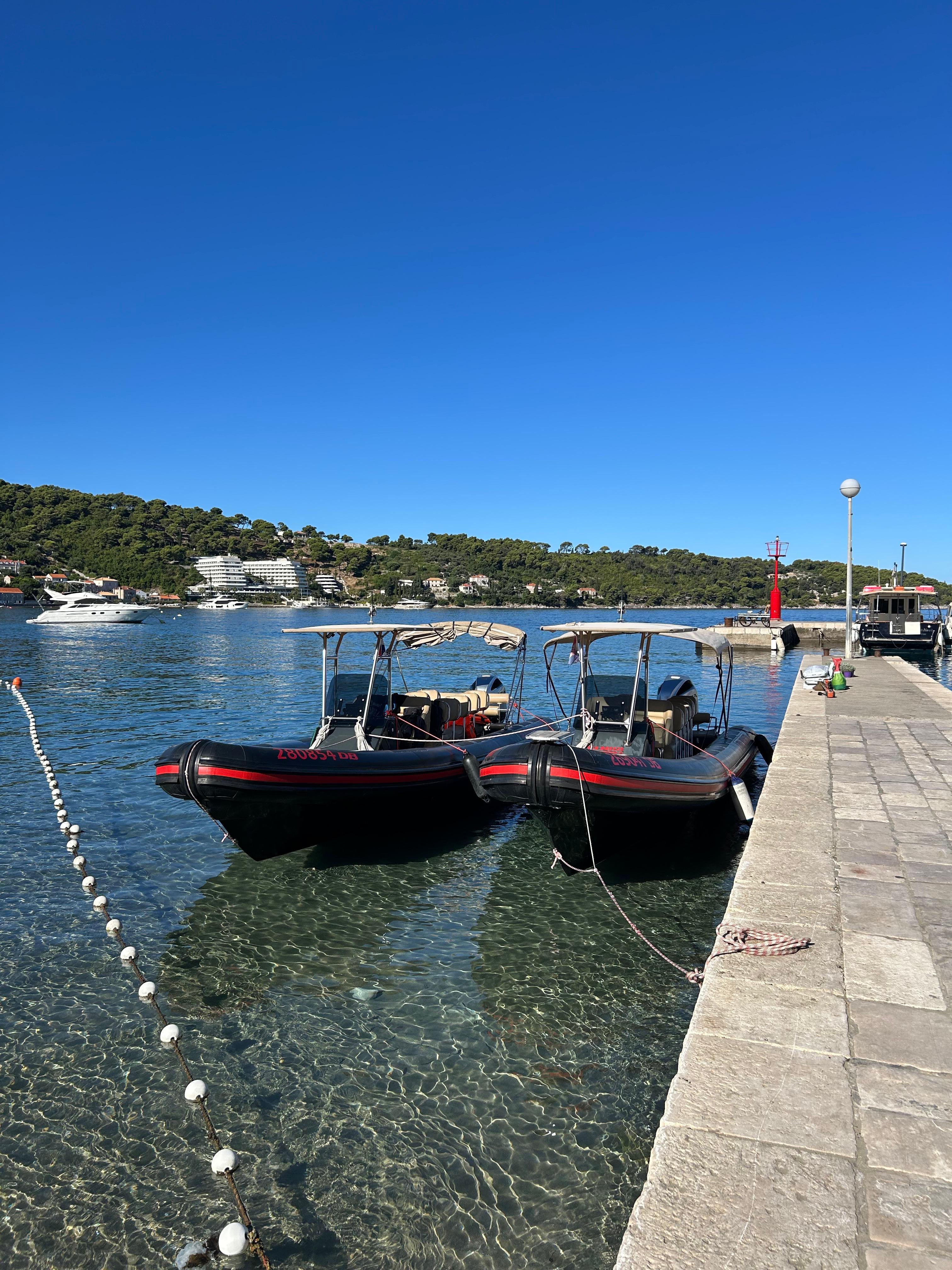 Two Dubrovnik Boat Excursion speedboats moored at the pier